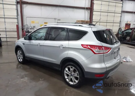 2014 Ford Escape Titanium z USA, uszkodzony, nr VIN 1FMCU9J98EUB63168